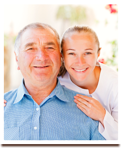 caregiver and old man smiling