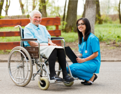 caregiver and her patient on wheelchair